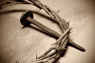 Closeup of a representation of the crown of thorns and a nail