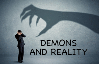 The title of this article is DEMONS AND REALITY. The picture is a business person afraid of a big monster claw.