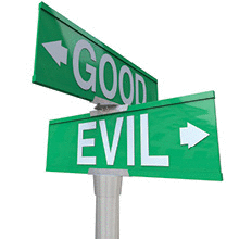 Street signs pointing to good and evil.