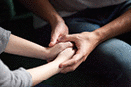 Close up view of couple holding hands