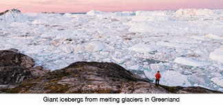 Global warming--Greenland Iceberg landscape of Ilulissat icefjord with giant icebergs.