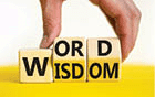 Wisdom/Word on wooden cubes.