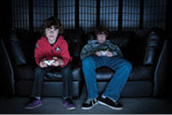 Boys playing a video game