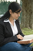 Woman reading the Bible.
