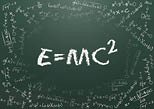 E=mc2 on a chalkboard