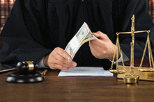 A corrupt judge holding money